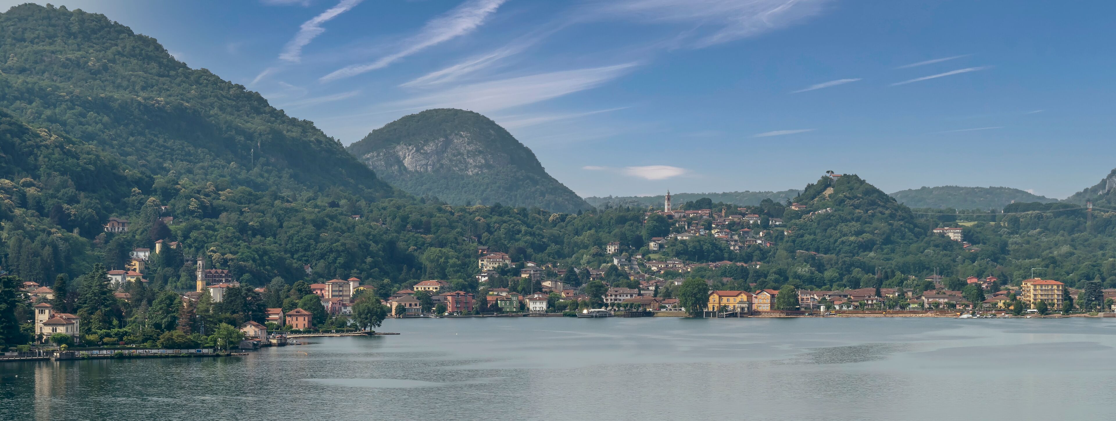 Panoramic view of Porto Ceresio, Italy and Lake Lugano from Morcote, Switzerland