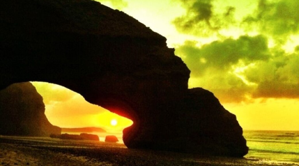 Sunset by the weird rock formations in legzira beach, Morocco #morocco #legzira #sunset #travelphotography #bigh