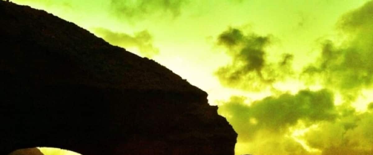 Sunset by the weird rock formations in legzira beach, Morocco #morocco #legzira #sunset #travelphotography #bigh