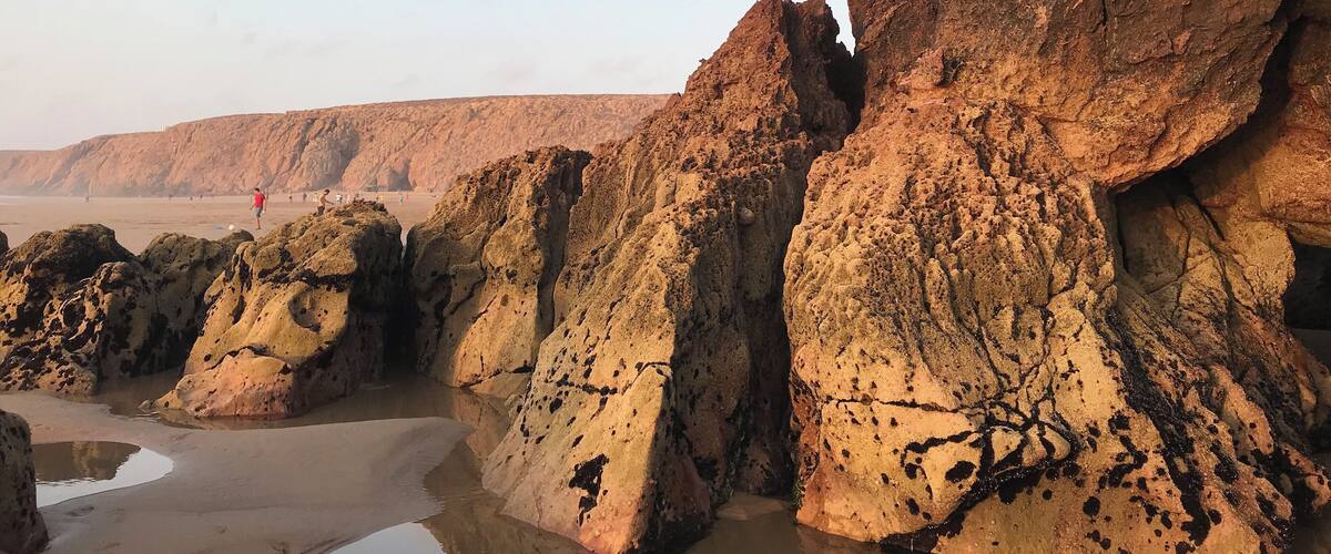 Imin Tourga beach in Mirleft Morocco has one of the cleanest and largest shorelines in Mirleft. This was taken as the sun was setting. It’s also a great place to watch the sunset. #morocco #mirleft #imintourga #travelmorocco #travel #africa #beaches #northafrica #flashpackingbarbie #nofilter #naturallight #moroccanbeaches