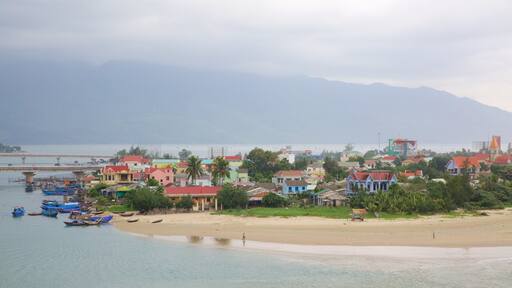 Lang Co which includes general coastal views, mist or fog and a sandy beach