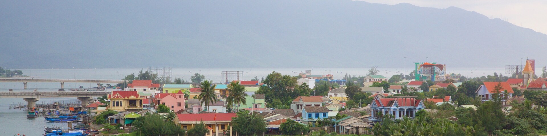 Lang Co which includes general coastal views, mist or fog and a sandy beach