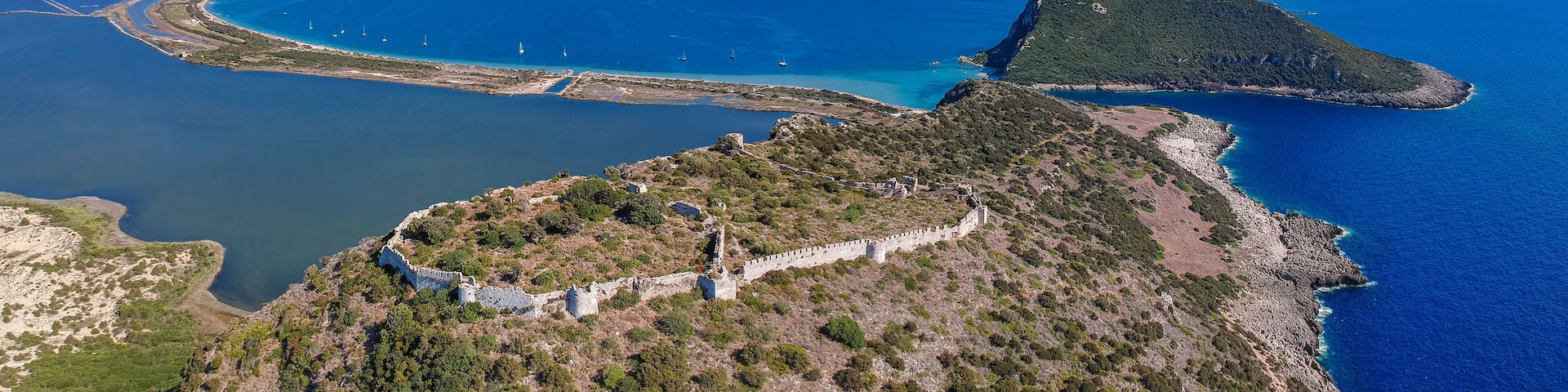 Aerial panoramic view over the ancient venetian castle paleokastro near Voidokilia beach in Messenia, Greece