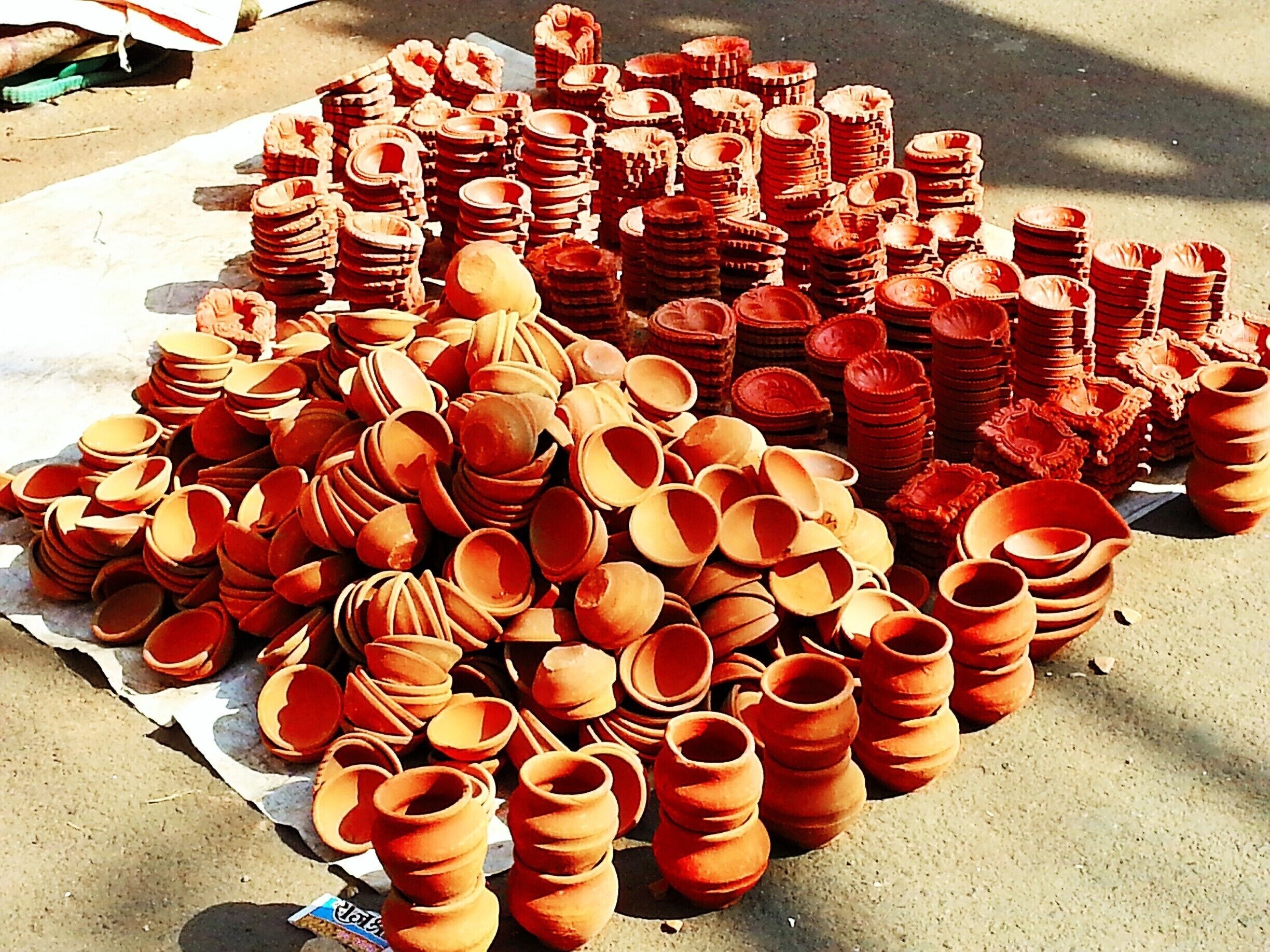 Traditional Earthern lamps in a Diwali Baazar in Bhopal in the state of Madhya Pradesh in India

https://theredbagandpurpleshoes.wordpress.com/2014/10/26/the-unstoppable-festive-spirit-diwali-bazaars-of-india/