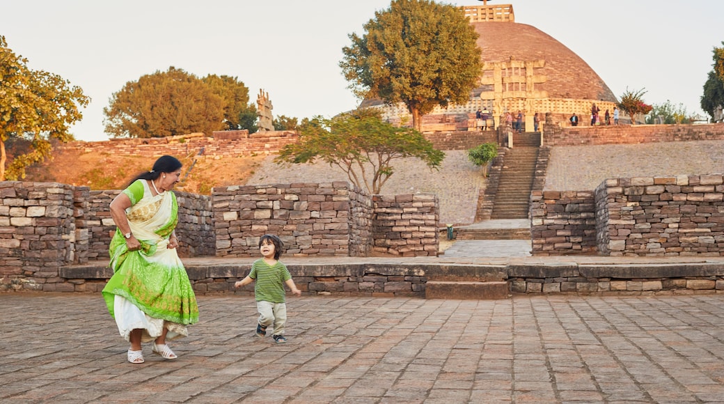 Grandmother playing with grandson at square, Bhopal, Madhya Pradesh, India