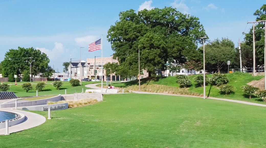 Panorama aerial view the metal panel installation representing of USS West Virginia in WWII, Doris Miller sculpture, American flag at memorial in Waco, Texas