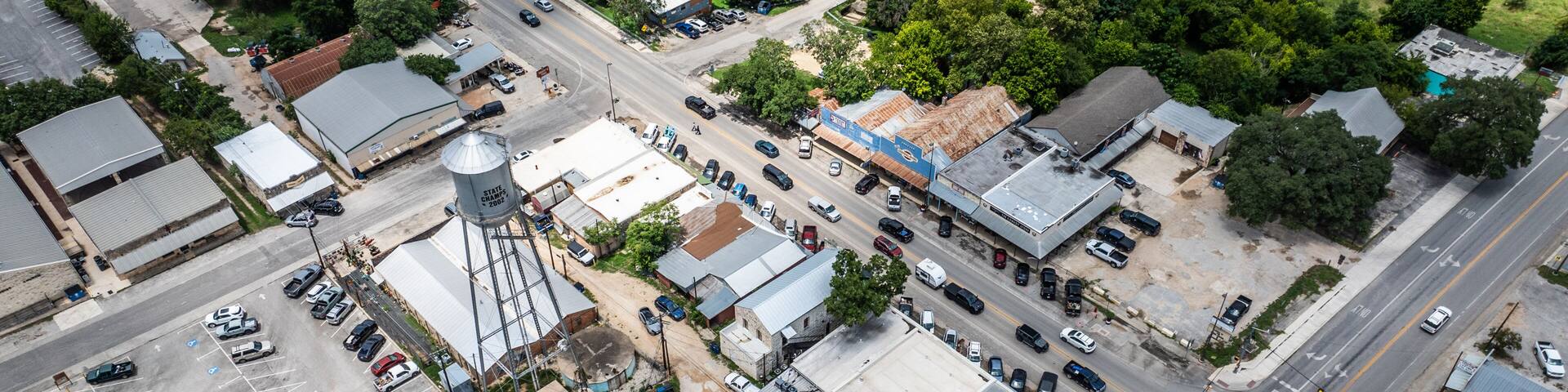 aerial city view of Bandera in Texas, US, around the Main St. with local stores and old water tower. The city is know as "Cowboy Capital of the World"
