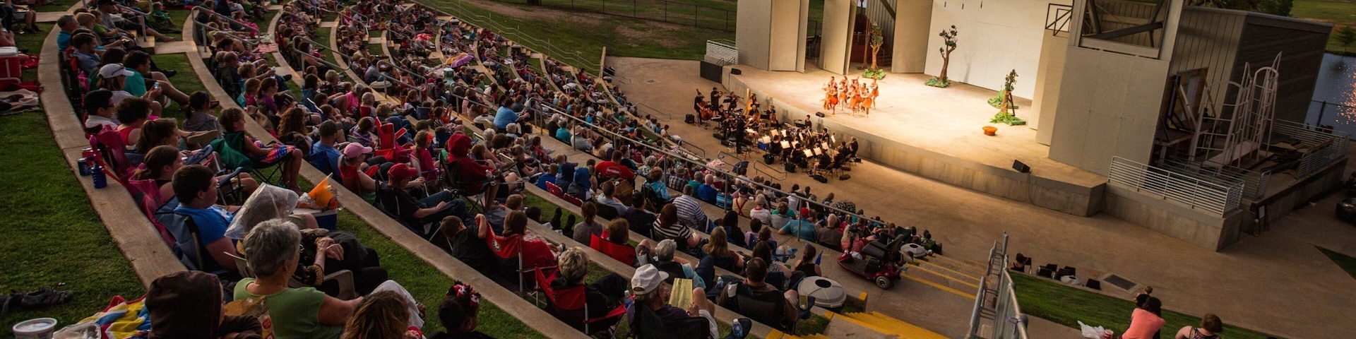 Lubbock which includes performance art and theater scenes as well as a large group of people