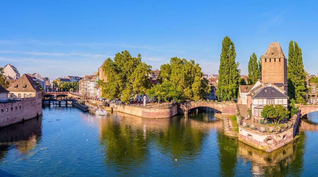 Panoramic view of the Ponts Couverts (covered bridges), a medieval set of bridges and defensive towers on the river Ill at the entrance of the Petite France historic quarter in Strasbourg, France.
