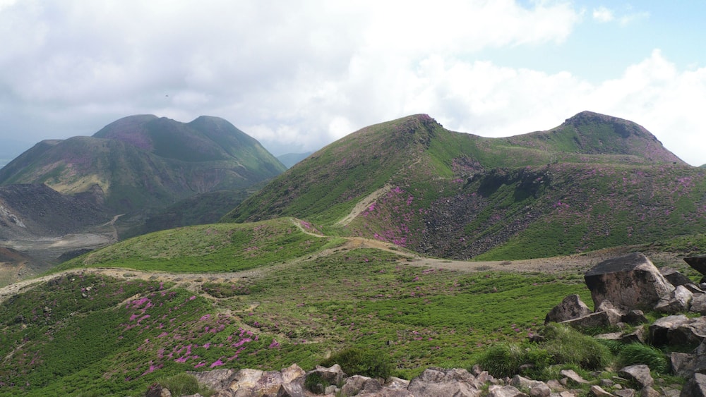 View of Mounts Naka and Mimata in the Kuju Mountains, Oita Prefecture, Japan, as seen from the top of Mount Kuju
