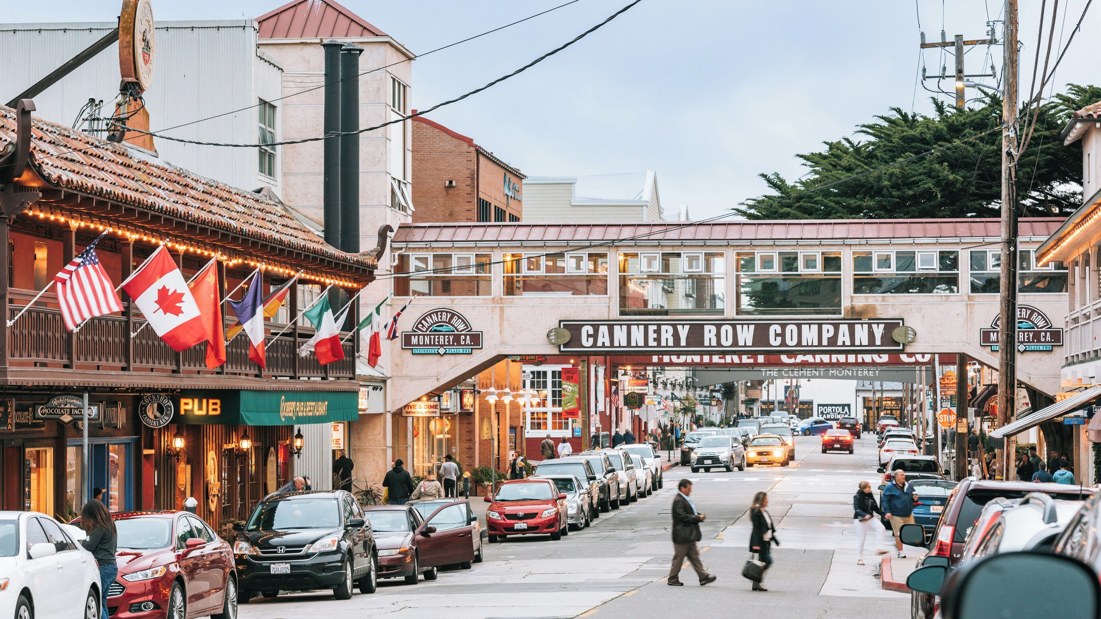 Exploring Cannery Row in New Monterey, California, with Vibrant Shops and Coastal Charm