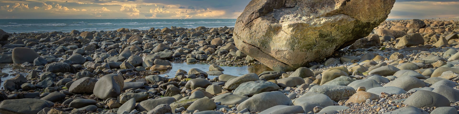 Beautiful shingle beach near to the Cae Du Farm, Wales.