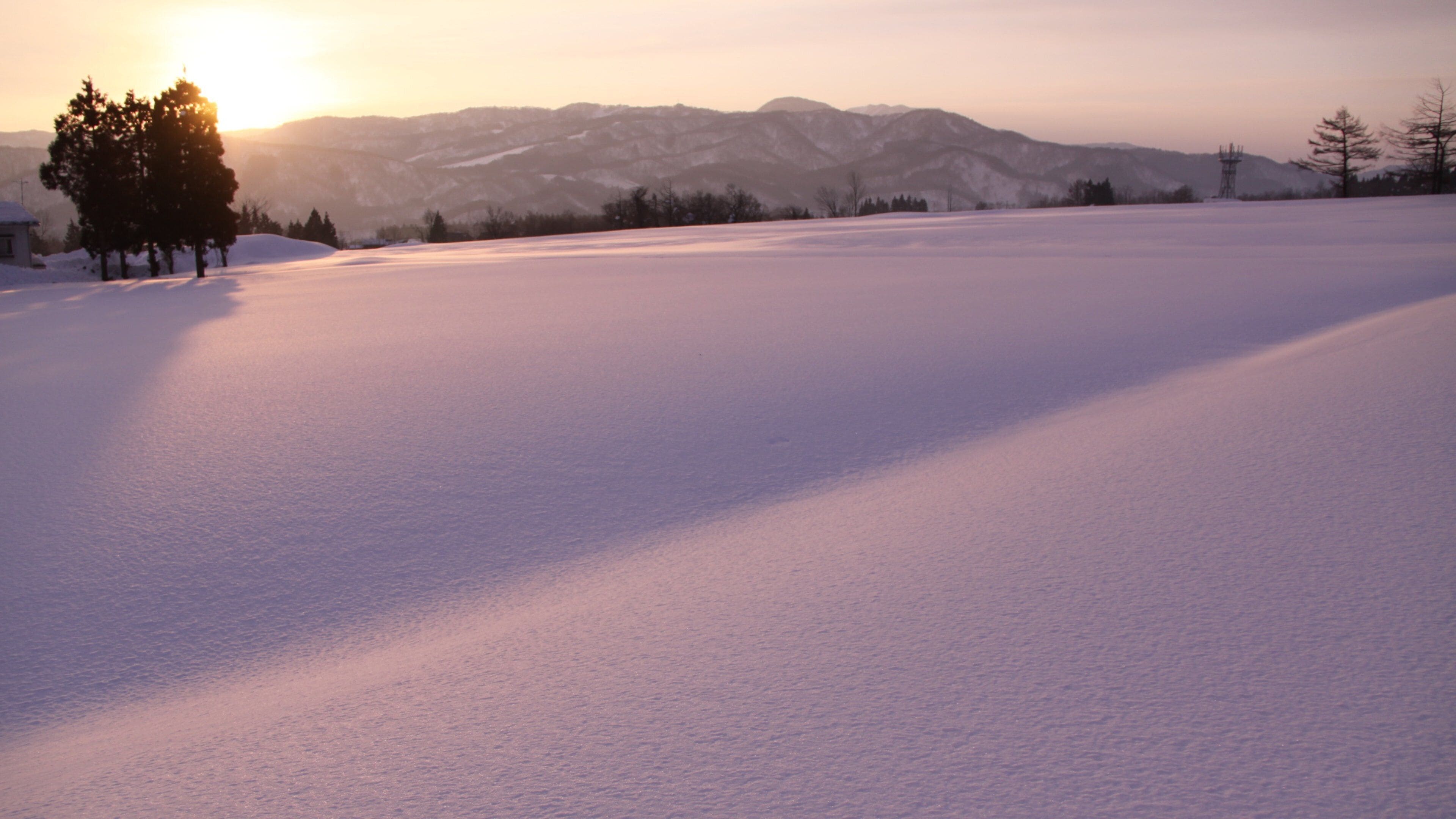 Myoko featuring snow and a sunset