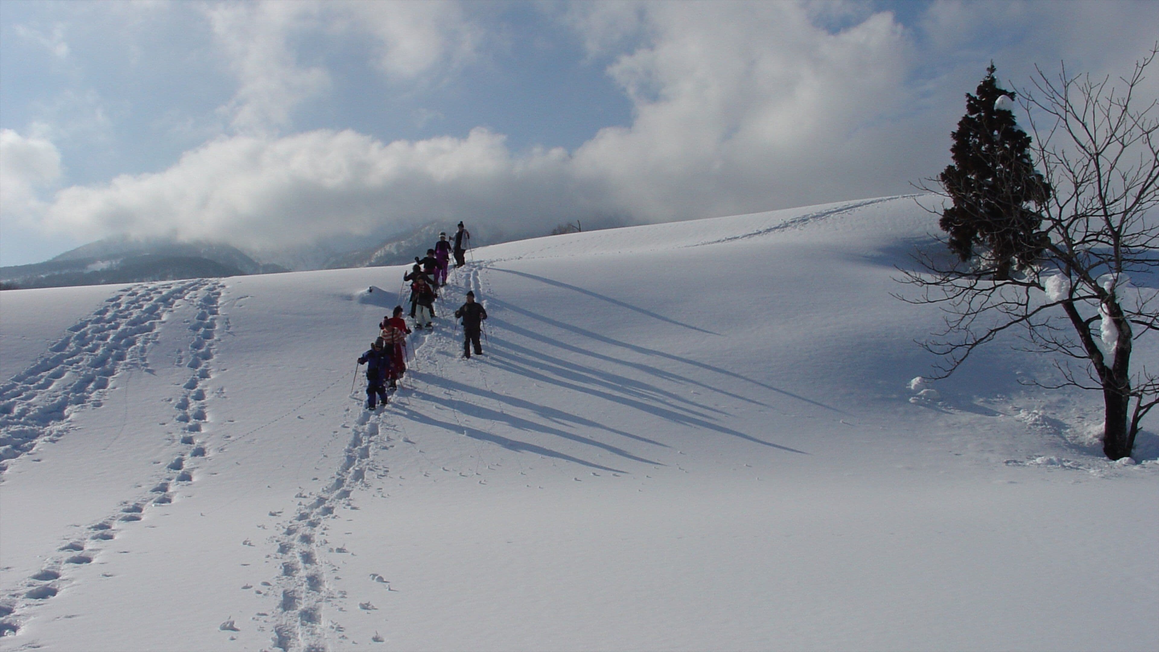 Myoko which includes snow and snow shoeing as well as a small group of people