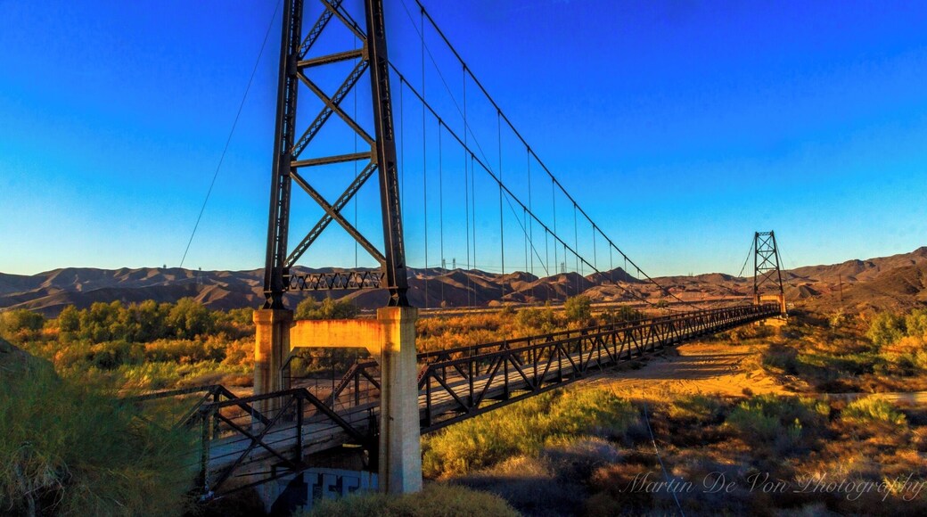 This 800-foot-long suspension bridge spanned the Gila River when it was built in 1929, and was named McPhaul Bridge in honor of Henry Harrison McPhaul, "the only Yuma resident who ever became an Arizona Ranger." But it was considered to be too flimsy for modern traffic, and when a dam was built upstream in 1968 the river was diverted and the highway was rerouted over a much smaller bridge. This ultimately proved unwise, as a flood in 1993 destroyed the new bridge while the Bridge to Nowhere, with its broad span and high clearance, probably would have been just fine.