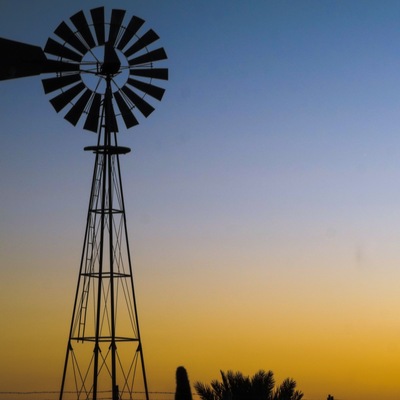 Windmill on the edge of the desert of the Yuma Foothills.