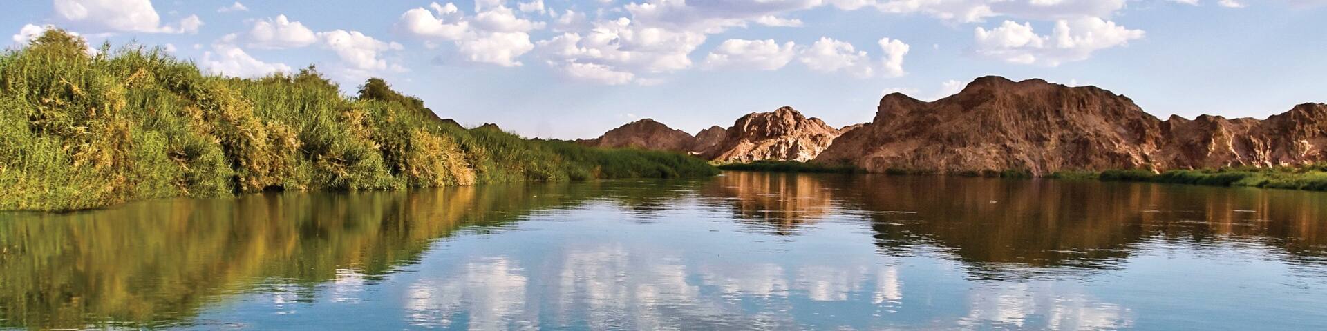 Yuma which includes a river or creek and mountains