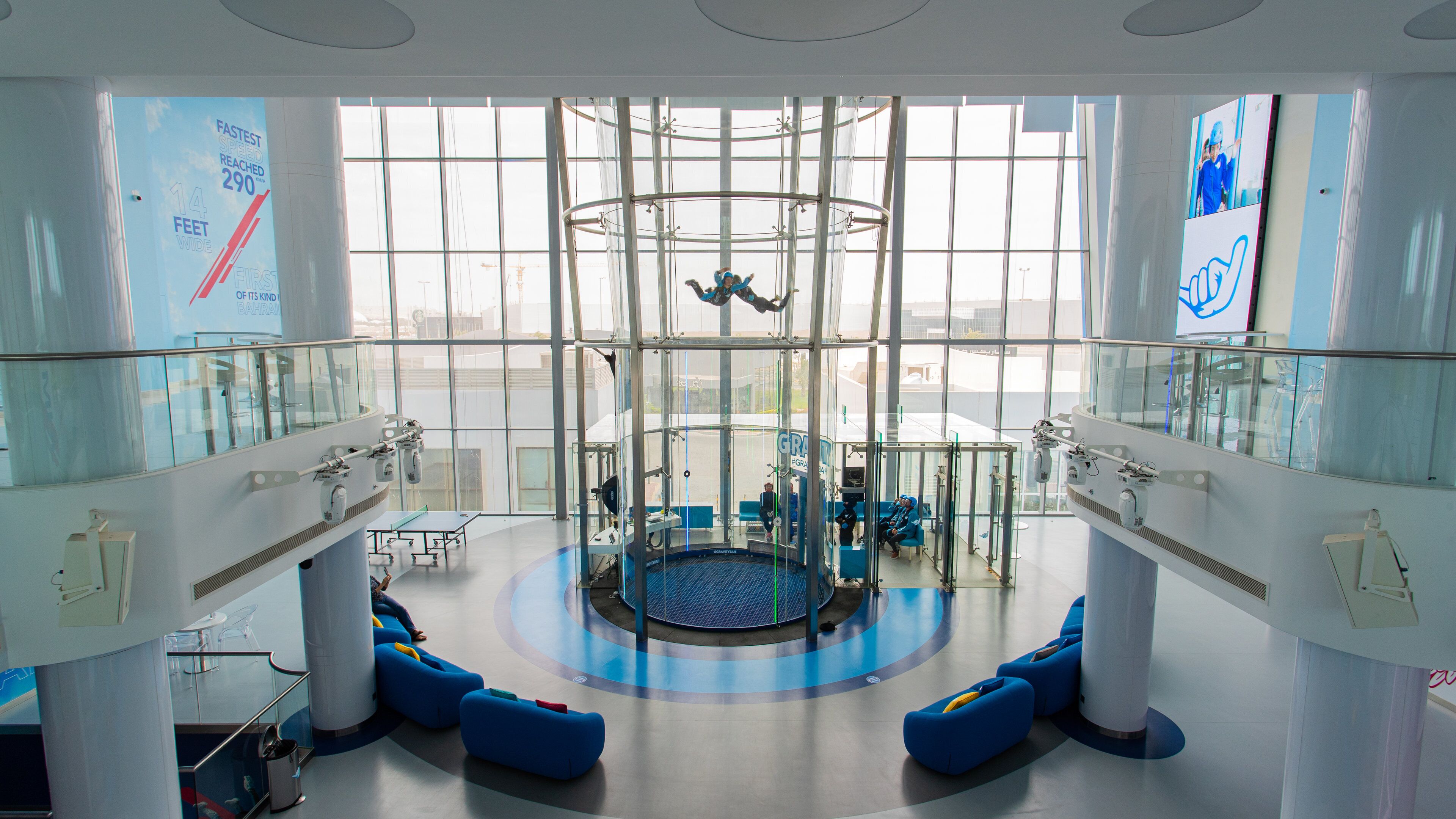 Zallaq featuring interior views and skydiving