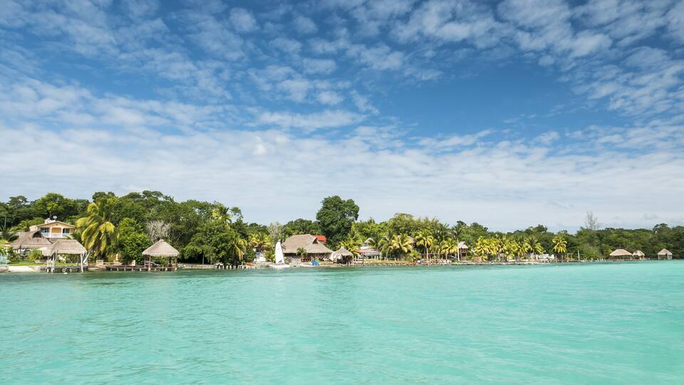 Beautiful view of caribbean lagoon Bacalar. Seven Color water; Shutterstock ID 384674023