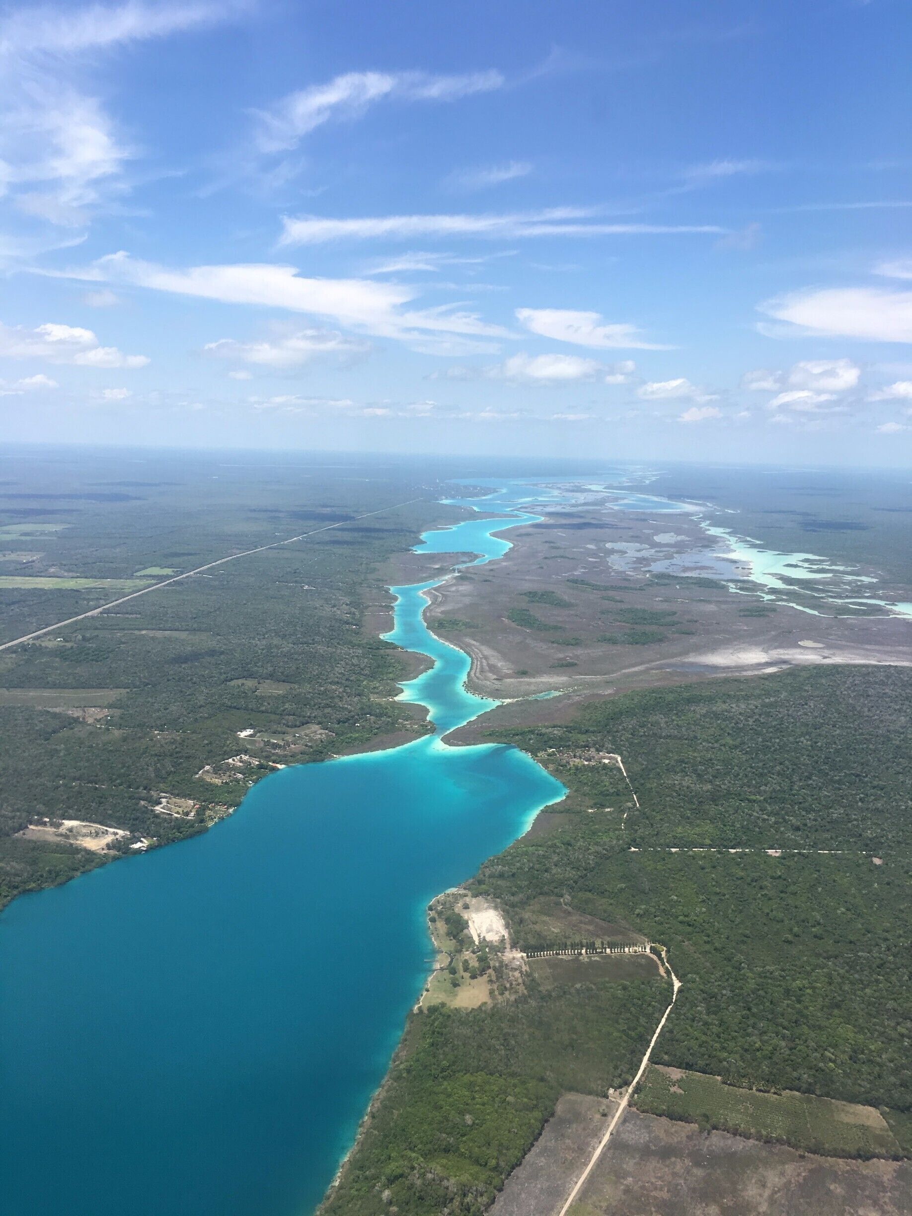 The most beautiful summer paradise hidden away in Mexico. Bacalar Lagoon has 7 different types of blue because of the overflowed cenotes. I recommend staying at Akal Ki Hotel and staying for about 3-4 days to make the most of it. #LifeAtExpedia