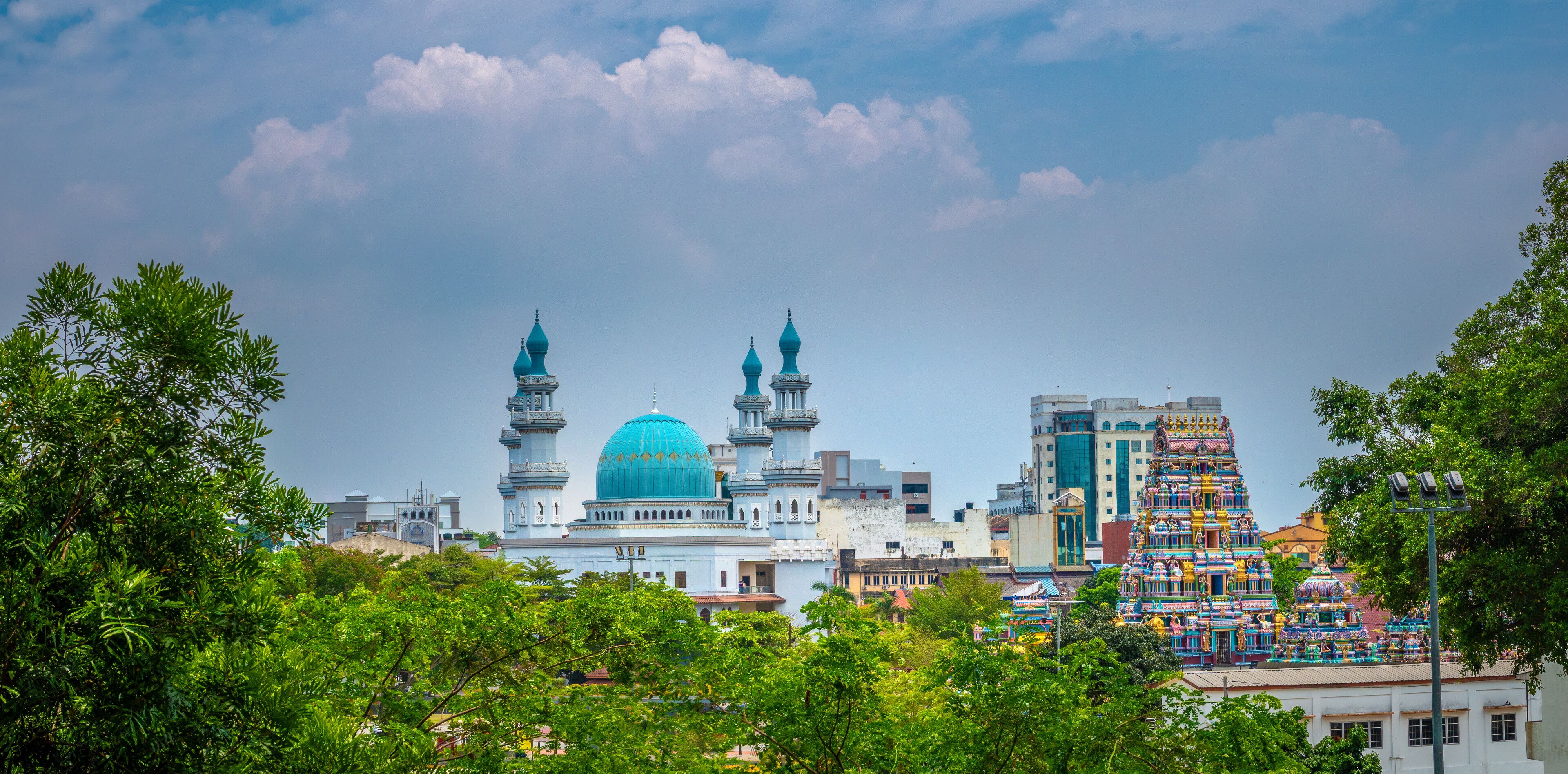 Mosques, Hindu temples and Churches in the skyline of the royal city of Klng, Selangor, Malaysia