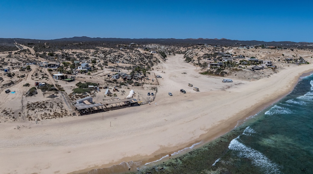 panoramic aerial landscape view of shoreline near La Fortuna, San José del Cabo, B.C.S. located on Baja California Sur, Mexico, with houses, buildings as well as wide white beach and rural landscape