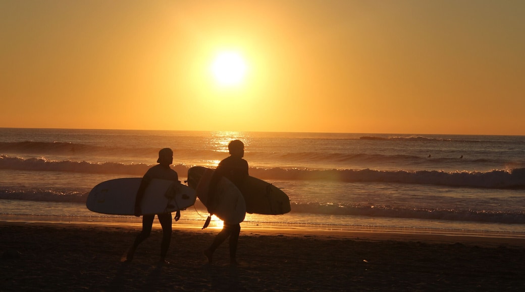 After yoga, swimming and a hike along the coast, we watched the surfers start to come in from the beach to the awesome little shack for a drink. These two heard my camera clicking and shouted in a playful way "That's 5 euros!" We all laughed. I'd gladly offer them a fiver for their role in this picture, it's one of my favourites.
#BeachBound