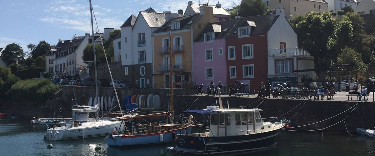 A harbor with colorful buildings and boats.