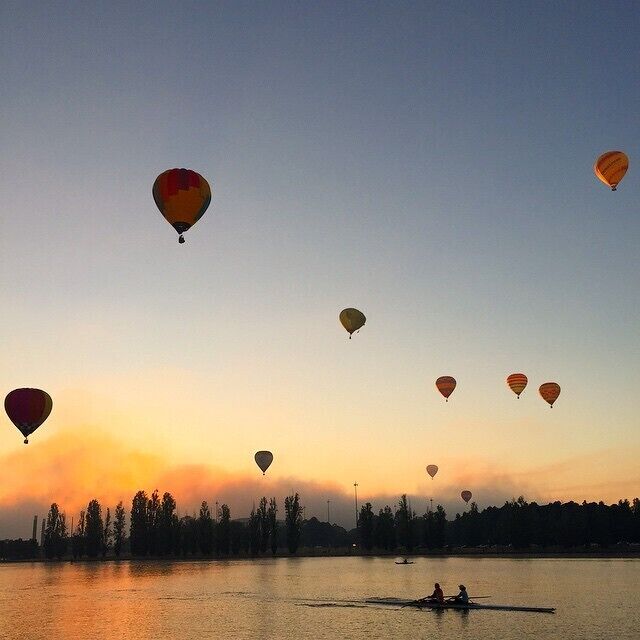 Every March, Canberra hosts a number of Festivals.  The one designed for the early risers is the Canberra Balloon Spectacular. Over 9 days, hot air balloons rise from the lawns of Old Parliament House and Reconciliation Place and glide across lake Burley Griffin as the sun rises.  You can get a really good vantage point from the National Museum of Australia's shores and if you are lucky, you can catch some fog and kayakers to make your pictures that much more magical.
#festival #goldenhour
