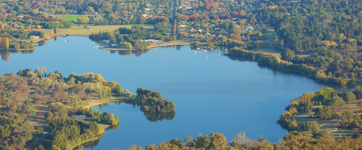 Acton featuring forests and a lake or waterhole