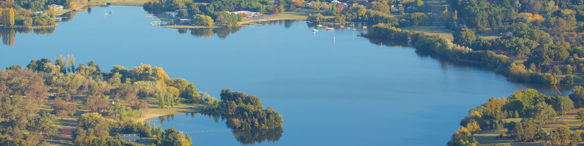 Acton featuring forests and a lake or waterhole