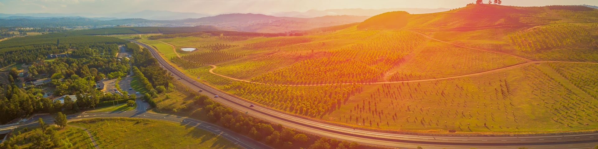 Aerial panorama of beautiful countryside at sunset in Canberra, Australia