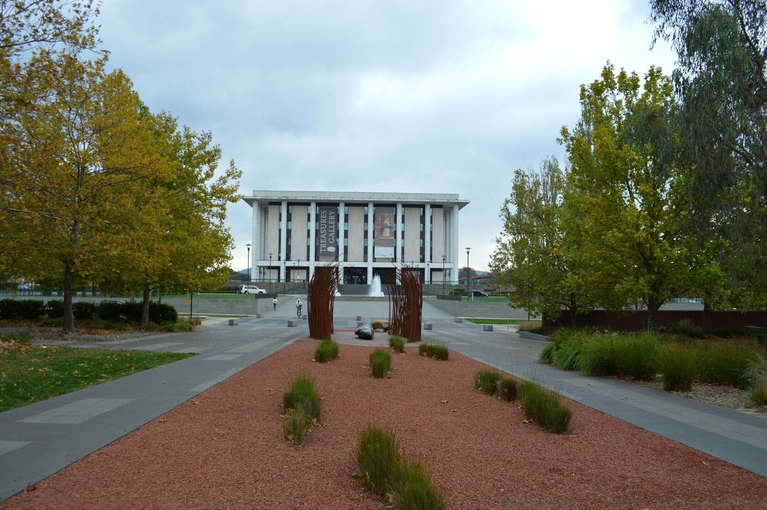 LET THE CREATIVE JUICES FLOW IN CANBERRA.
It seems that Canberra has the creative edge. 
From driving the streets to walking through gardens, there is something to admire and appreciate.
With pockets of new housing developments (architecturally designed) to sculptures and works of art, not to forget all the memorials around this fine city… Canberra has it all and more. 
For me personally, the next greatest enjoyment, second to travel is appreciating all forms of art. A random cyclist stopped to ask me my thoughts on the piece I was photographing … his words were ‘organic in form’ and ‘sublime’. Words which he felt the piece reflected. I too thought the same yet to others it may just be some metal strips and a brown lump with no form or connection. On closer inspection, the sculptural piece has another purpose. Utilising the wind, it would sing softly and only when close, you can hear its voice.
A piece of art or a sculpture can speak volumes and it can reflect on history reminding us of mistakes we hope to learn from. It can also be a simple piece which stands out as a funky inanimate object. I loved the giant pot plants outside the Beaver Gallery. Other pieces I enjoyed were in the sculptural gardens outside Questacon. 
Whatever your taste, it’s a place to be free in thought.
#Canberra#sculptures#art#appreciation