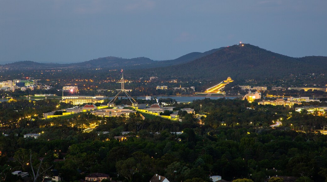 Red Hill which includes night scenes, landscape views and a city