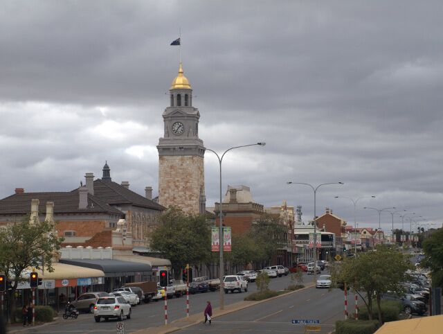 Kalgoorlie Post Office - Hannan Street.

Built from pink sandstone, the Kalgoorlie PO was opened early in February 1899 to house government offices. 

The  clock tower is crowned by clocks specially imported from England and installed on 11th August, 1900.