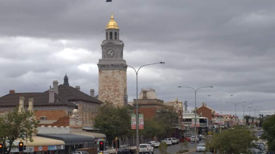 Kalgoorlie Post Office - Hannan Street.
Built from pink sandstone, the Kalgoorlie PO was opened early in February 1899 to house government offices.
The clock tower is crowned by clocks specially imported from England and installed on 11th August, 1900.