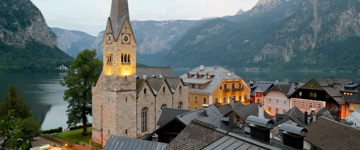 Hallstatt showing a sunset, heritage elements and a lake or waterhole