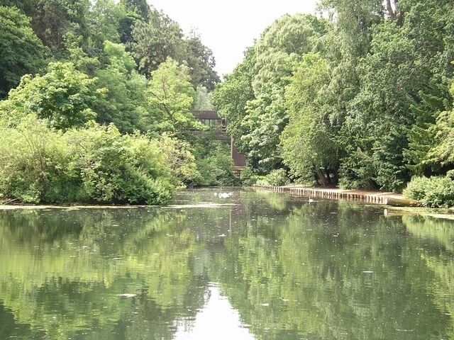 The Loch, Heriot-Watt University. The Loch in the centre of the University's Riccarton Campus. Just visible is the bridge connecting the main entrance with the Hugh Nisbet building.