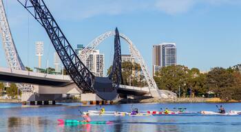 Burswood which includes a bridge, a river or creek and kayaking or canoeing