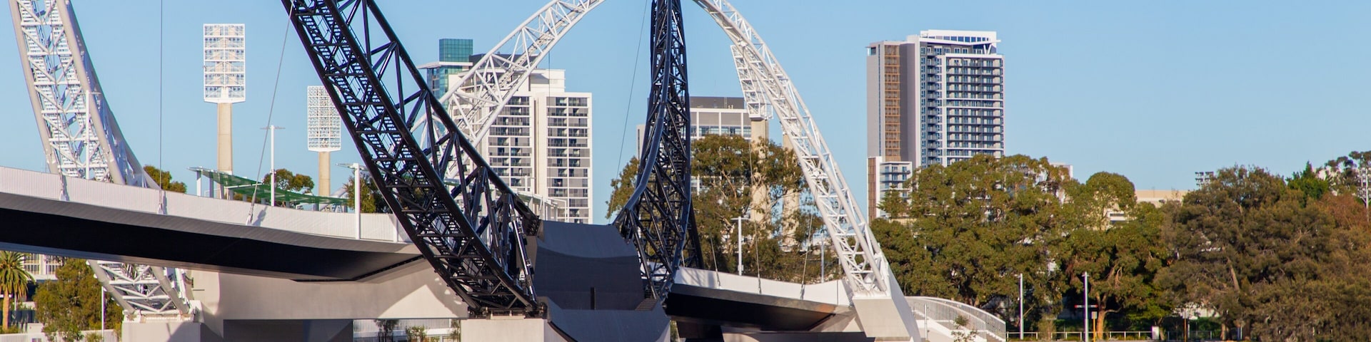 Burswood which includes a bridge, a river or creek and kayaking or canoeing