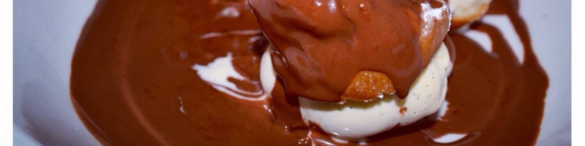 Heavenly delicious. Profiteroles with vanilla bean ice cream and warm chocolate sauce. #amazing #food #restaurant #perth