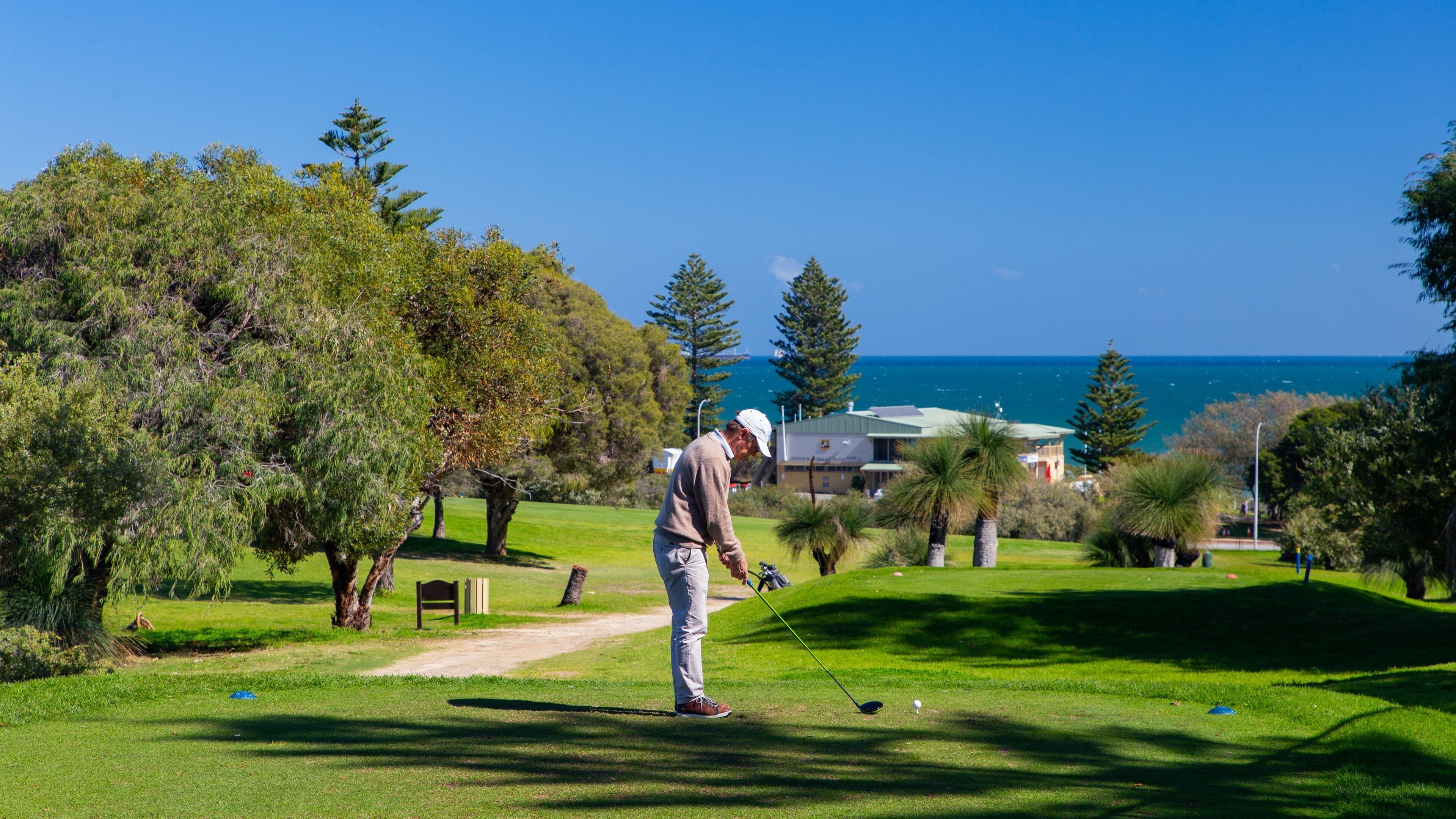 Cottesloe featuring golf as well as an individual male
