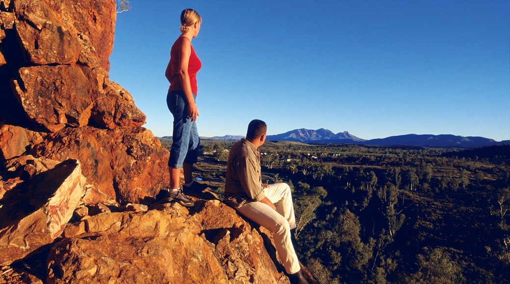 West MacDonnell National Park featuring a sunset, hiking or walking and landscape views