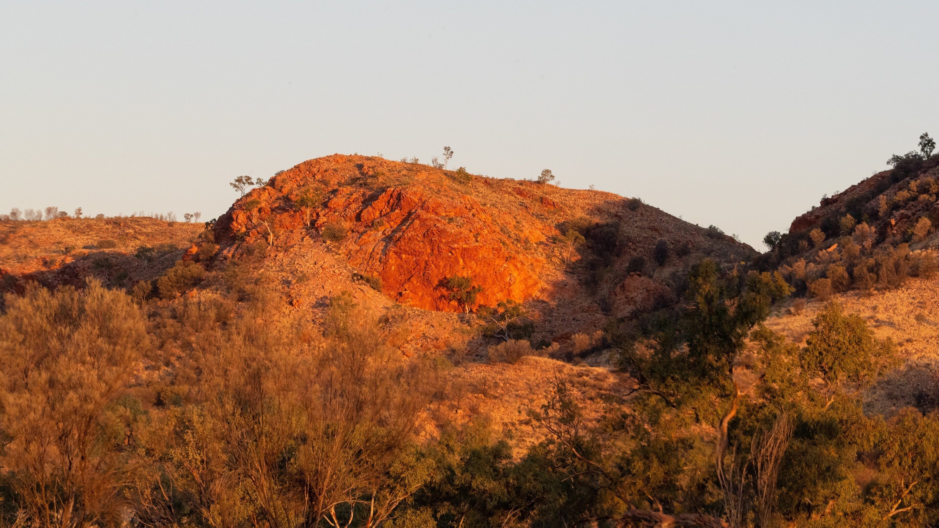 Tjoritja-West MacDonnell National Park featuring a gorge or canyon, a sunset and desert views