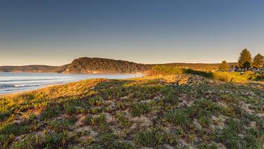 Early Morning Beach Panorama with Dunes