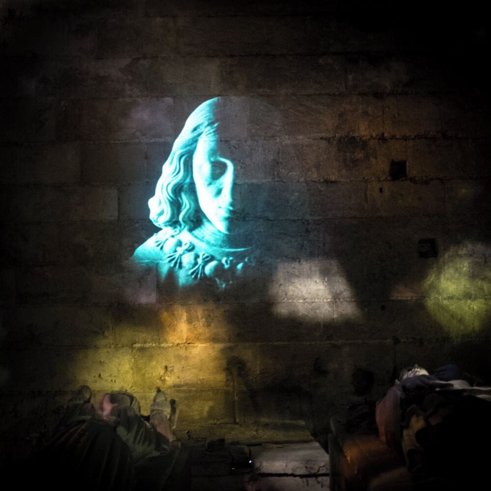 Statues and monuments in the underground vaults of the Chateau