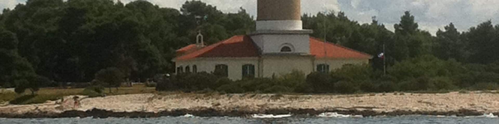 On the way to Saharun, one of the most famous Croatian beaches, you will pass near lighthouse Veli Rat.
You can rent an apartment in the lighthouse. It would be great to wake up few steps from the sea! Don't you think?