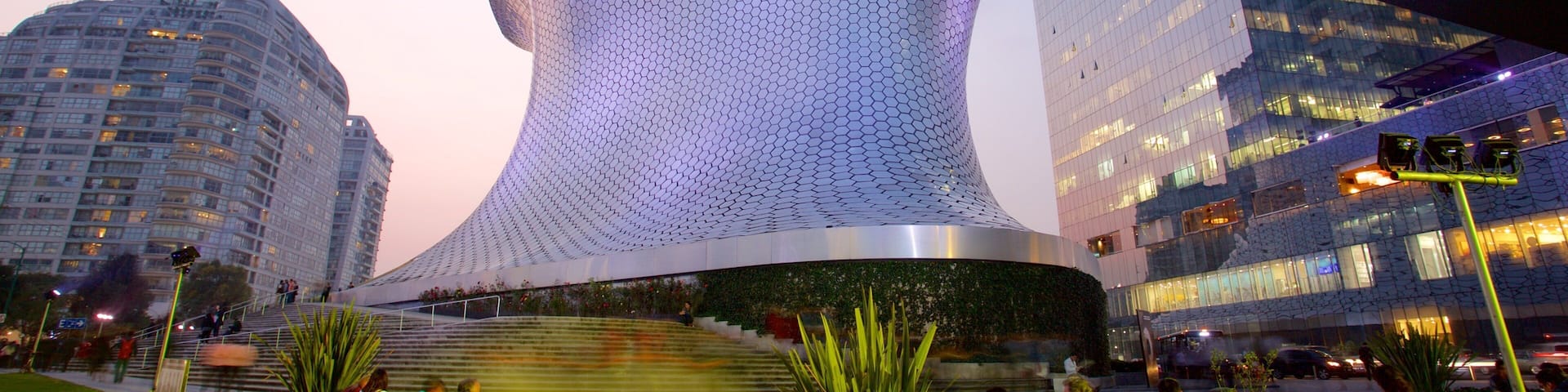 Miguel Hidalgo featuring a sunset, modern architecture and a city