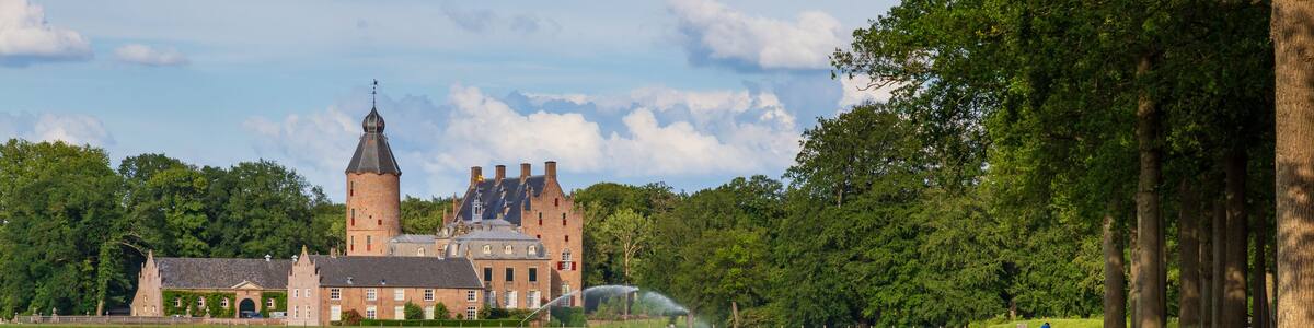 Rechteren, Netherlands - June 20, 2020: Rechteren Castle and road in municipality of Dalfsen, Overijssel in the Netherlands