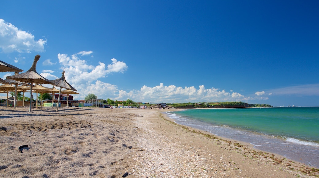 Vama Veche which includes general coastal views and a beach